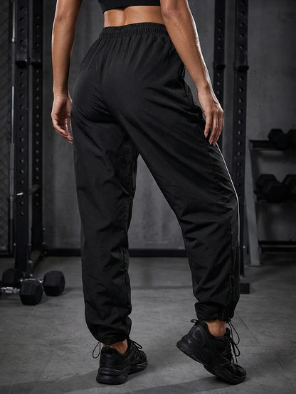 Womens Athleisure Pants with Adjustable Cord Locks Gym Workout Running Trousers with Side Pockets Athletic Quick-Dry Sweatpants