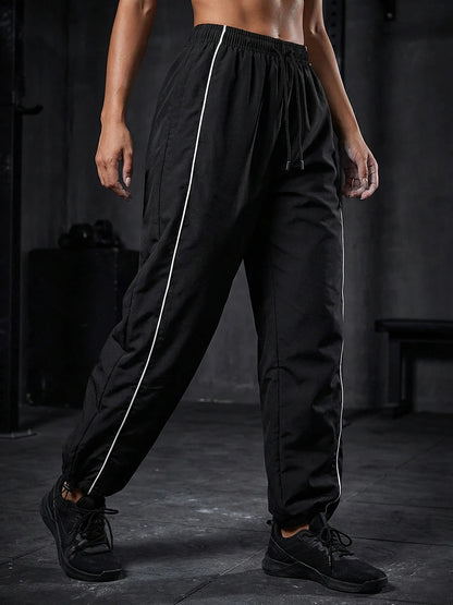Womens Athleisure Pants with Adjustable Cord Locks Gym Workout Running Trousers with Side Pockets Athletic Quick-Dry Sweatpants